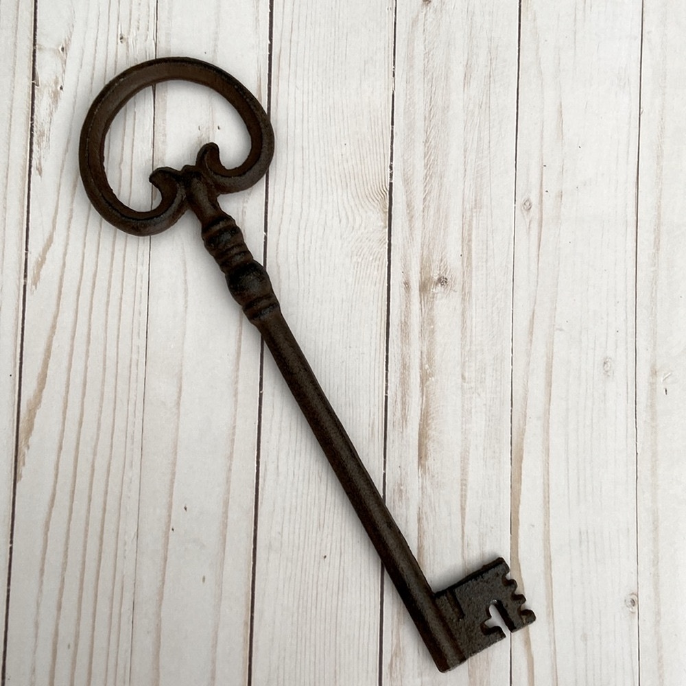Old, metal rustic key 13” long. Beautiful home decor for a farm house and more!